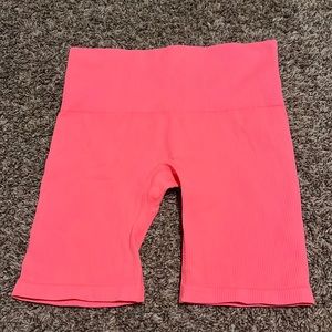 Bright peach/pink biker shorts